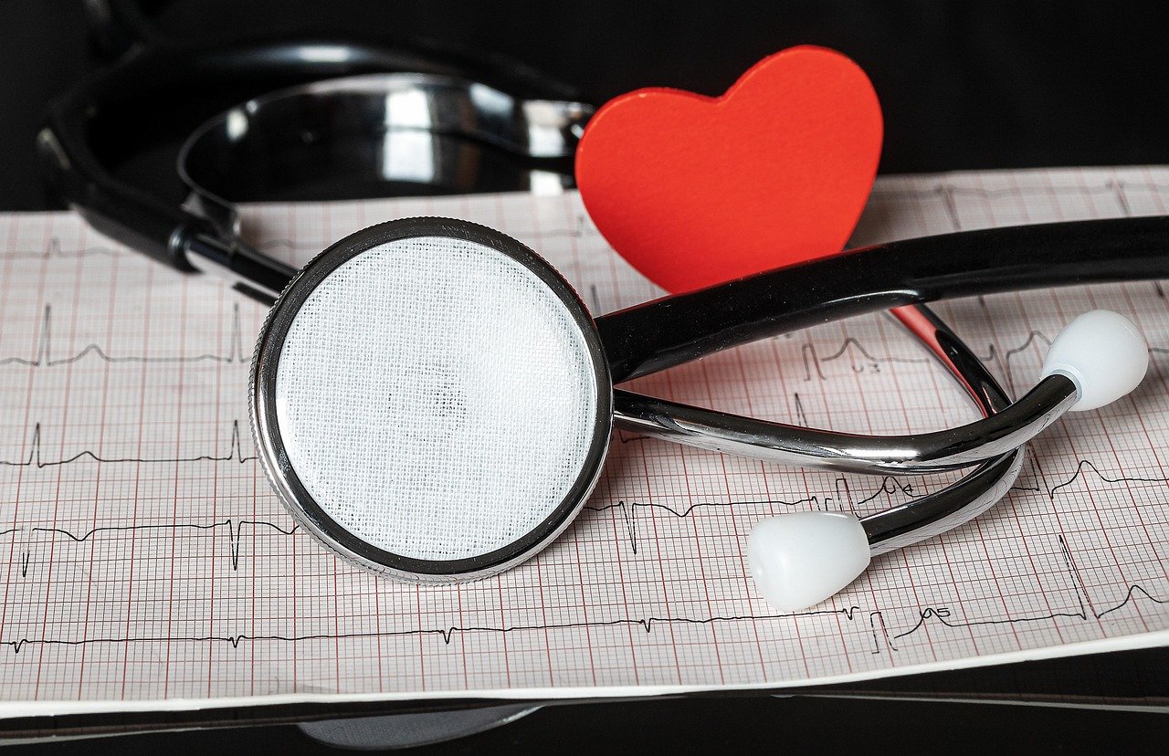 Heart Attack Warning Signs - stethoscope, ecg